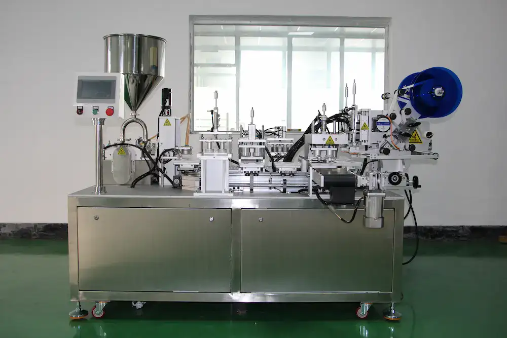 GZQD-200 2-out air cushion BB cream filling machine, compact dual-station model with automatic surface labeling for small & medium cosmetic workshops